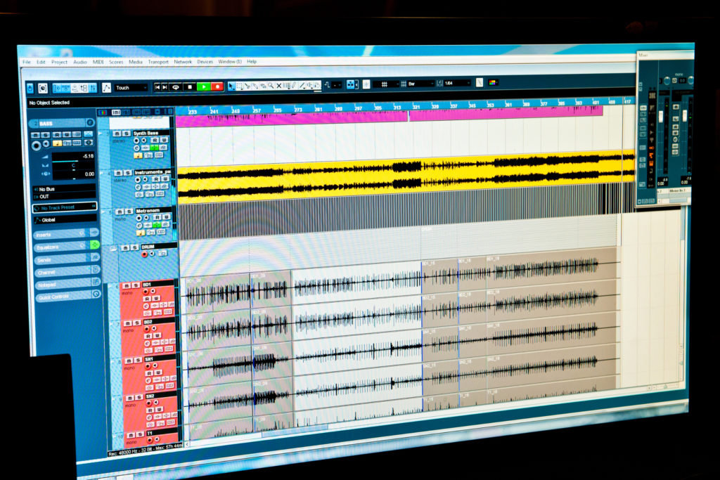 A screenshot of recording studio technology that includes computer software for mixing and mastering. 